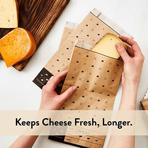 Hands placing cheese into storage bags with text 'Keeps Cheese Fresh, Longer.'