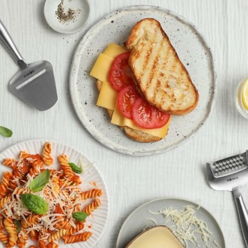 Grilled cheese sandwich with tomatoes and pasta with sauce and cheese