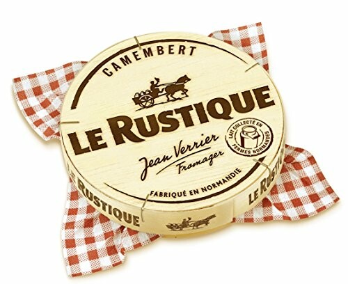 Le Rustique Camembert cheese packaging on checkered cloth.