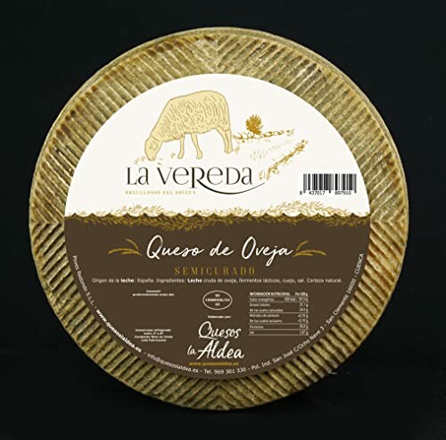 Wheel of semi-cured sheep cheese with La Vereda label